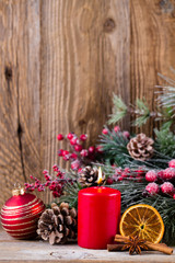 Christmas greeting card. Festive decoration on wooden background. New Year concept. Copy space.  Flat lay. Top view.