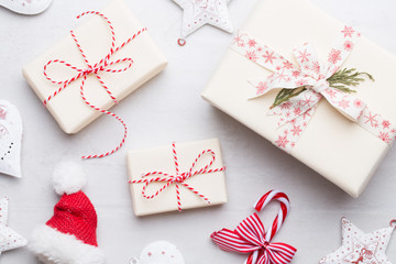 Christmas composition. Gifts, stars  decorations on white background. Christmas, winter, new year concept. Flat lay, top view, copy space.