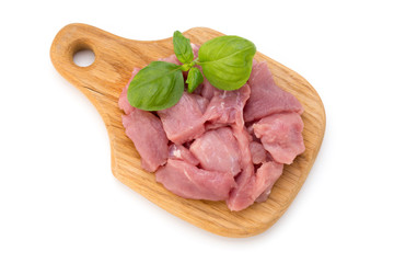 Raw chopped beef meat pieces isolated om white background cut out.