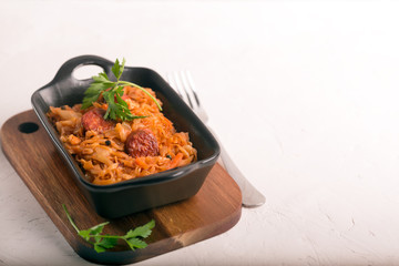 Bigos, a traditional Polish dish with cabbage. White background