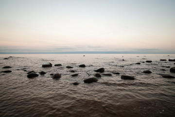 frozen sea side beach in winter with lots of ice and snow