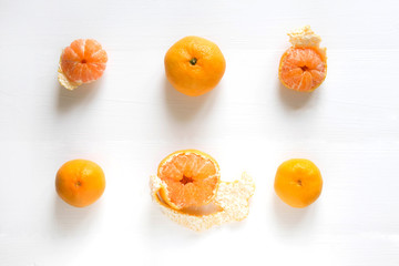 Background with citrus, mandarin. Tangerines on a white wooden background. Copyspace banner. Basis for a banner with citrus. Frame for text