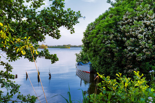 Boat in a lake with peaceful water 