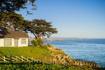 House on the Pacific Ocean coast on a sunny evening, Santa Cruz, California