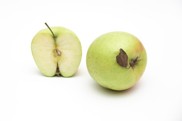 Ripe green apple fruit with apple half and green apple leaf isolated on white background. Apples with clipping path