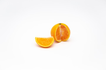 Ripe mandarin close-up on a white background. Tangerine orange on a white background.