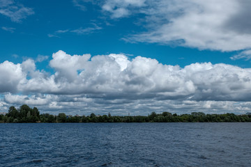 calm summer day view by the lake with clean water