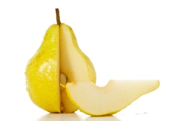 ripe yellow sliced pear isolated on white background