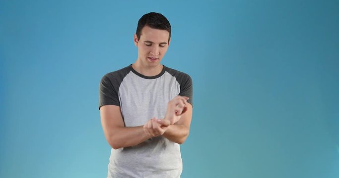 young man using perfume
