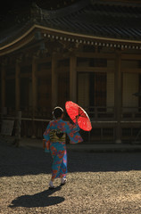 Geisha walking umbrella
