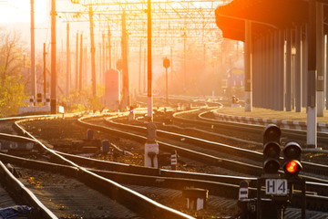The concept of the railway with a gleam of sunlight, the area is covered with railway tracks, rest...