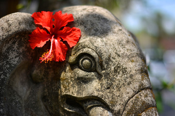 Elephant Sculpture with Red Flower