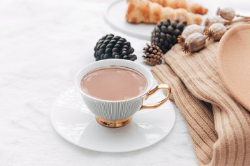 Autumn and Winter composition. Hot coffee with sweater