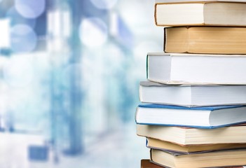 Books collection in pile on  background.