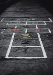 Hopscotch on the sidewalk.