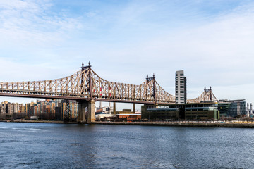 Fototapeta na wymiar New York City's Williamsburg Bridge Crossing Over From Manhattan to Queens