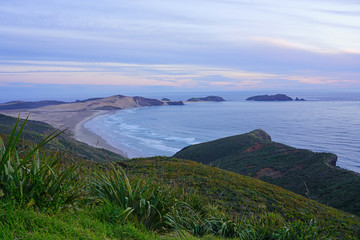 Fototapeta na wymiar View of the TePaki Giant Sand Dunes at Cape Reinga (Te Rerenga Wairua), the northwesternmost tip of the Aupouri Peninsula, at the northern end of the North Island of New Zealand
