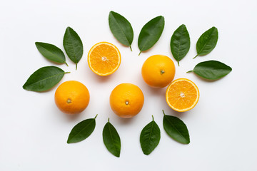 Fresh orange citrus fruit with leaves isolated on white wooden background.  Copy space