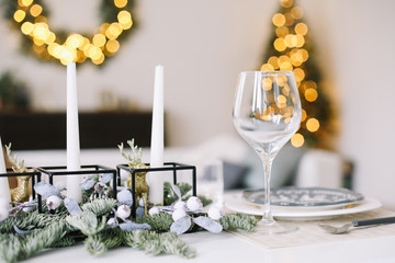 Serving a festive table. New year decorations. Christmas and  New Year concept