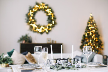 Serving a festive table. New year decorations. Christmas and  New Year concept