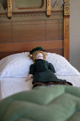 Doll toy on the bed