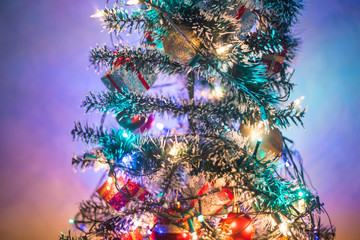 Obraz na płótnie Canvas Colorful christmas tree and lights
