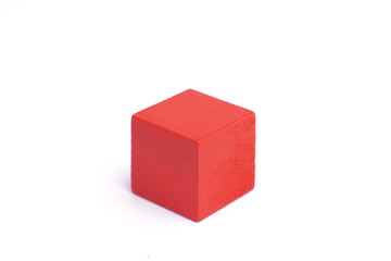 Red wooden blocks isolated on white background.