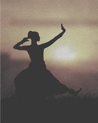 Indian Girl Dancing Under The Sunset  - obrazy, fototapety, plakaty