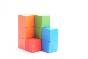 Obraz premium Colorful wooden cube isolated on white background.