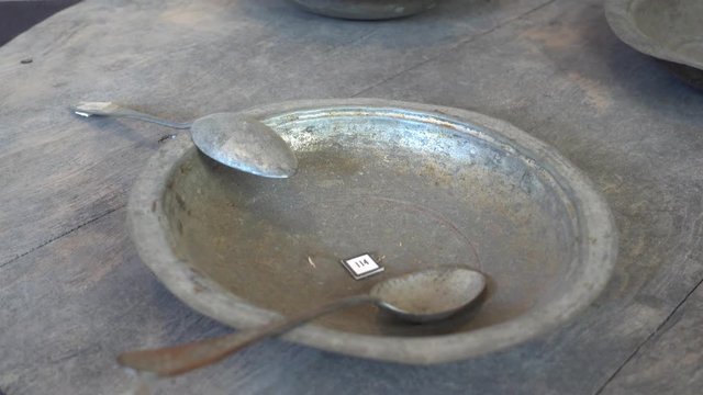Kas, Antalya, Turkey - 18th of May, 2017: 4K In the Kas museum of ethnography - Vintage metal plate with spoons