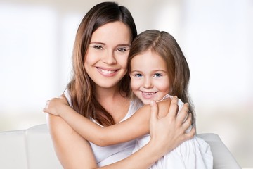 Happy Mother and daughter hugging