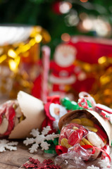 Christmas and New year gifts and baskets with sweets, alcohol, chocolate and cookies