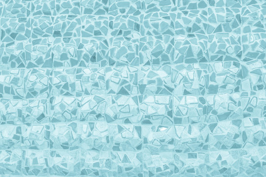 Broken tiles mosaic seamless pattern. Pastel Blue tile real wall high resolution real photo or brick seamless with texture interior background. Abstract wallpaper irregular in bathroom.