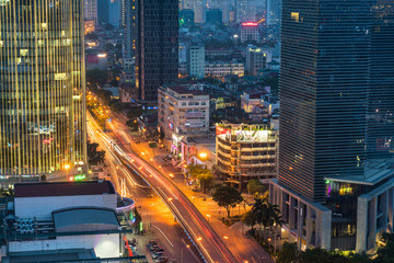 Obraz na płótnie Canvas Aerial skyline view of Hanoi. Hanoi cityscape at twilight at Lang Ha street, Ba Dinh district
