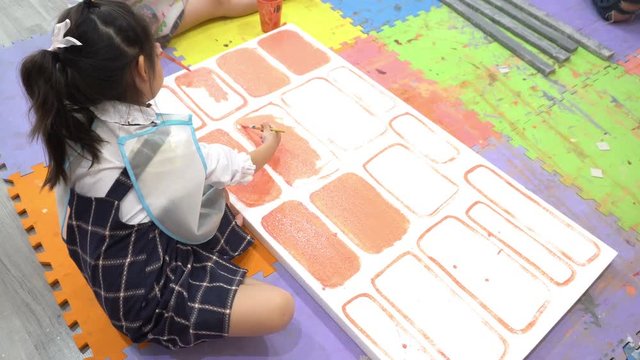 Young Asians studying art,Paint work to a teacher,Thailand people