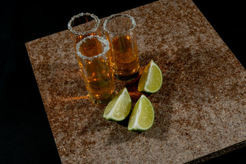 Golden tequila with lemon and salt. Drinks, Liquor