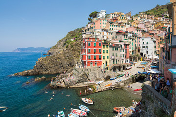 Fototapeta na wymiar Panoramic view of the harbour at Riomaggiore, one of the famous Cinque Terre villages
