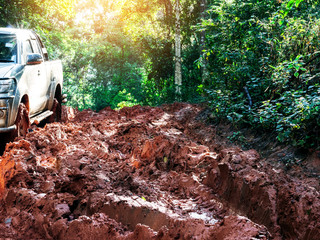 Off-road travel on mountain road after the rain.