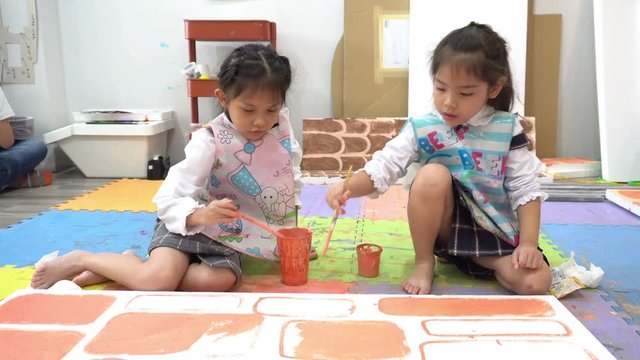 Young Asians studying art,Paint work to a teacher,Thailand people