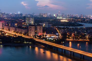 Aerial skyline view of Hanoi at Linh Dam lake, Belt Road No. 3. Hanoi cityscape by sunset period