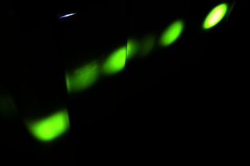 abstract green background with lots of light spots