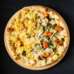 pizza on the black background