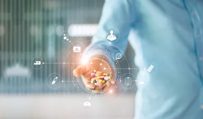 Crédence de cuisine en verre imprimé Pharmacie Medicine. Human holding drugs tablets and pills in hand with icon medical network connection on modern virtual screen interface, medicines, pharmaceutics and medical technology network concept