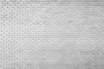 Abstract white smooth wallpaper texture stone brick pattern old stucco light gray and aged paint white brick wall background.