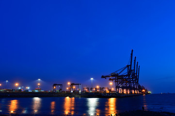 Fototapeta premium Port crane bridge and bulk carrier