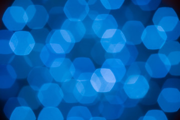 Abstract beautiful blurred electric blue hexagon bokeh from Ornamental lights flickering in the...
