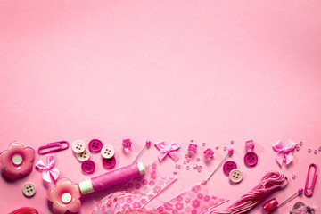 Sewing tool or a craft tool on pink background , top view or overhead shot with copy space