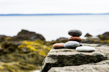 balanced stones on the beach