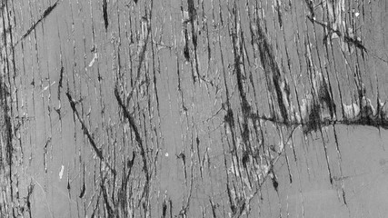 black and white background. peeling paint on an old wooden floor