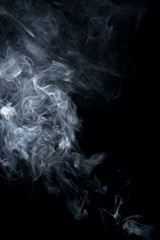 white smoke on black background